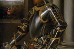 young-man-in-a-gold-decorated-suit-of-armour-1556